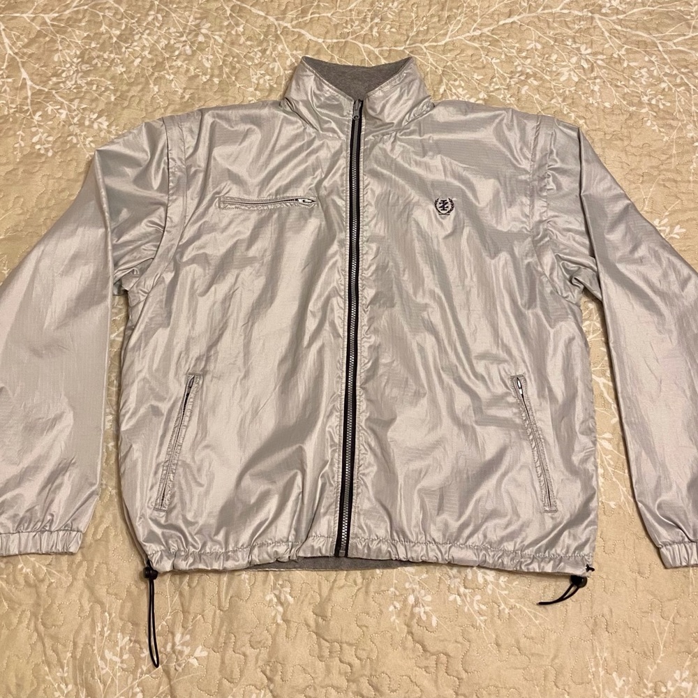 Izod all weather jacket, silver, fleece lined, zip off sleeves, size XL.